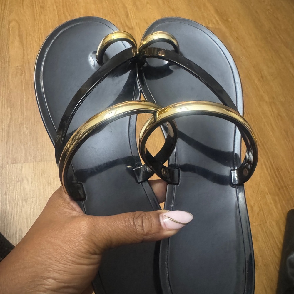 Steve Madden Glossy Black and Gold Sandals